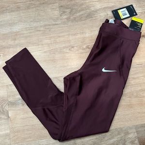 New Nike. Tight Fit. Running leggings. Size S. Burgundy.